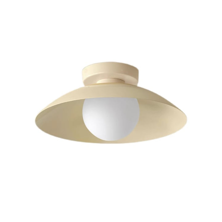Scallop Wall and Ceiling Light in a cream finish, side view showing the glass bulb cover