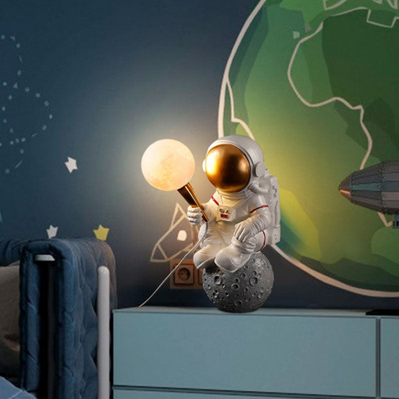 Creative Cartoon Astronaut Wall Sconce Light - Resin Wall Lamp for Bedroom and Living Room, 1-Light Fixture, 9.84 to 11.81 Width 9