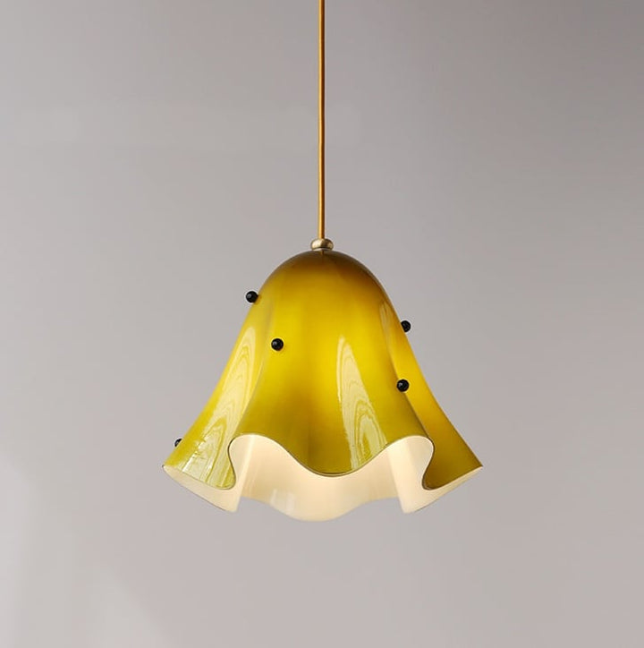 Draped Glass Pendant Light with a yellow glass shade and brass fitting