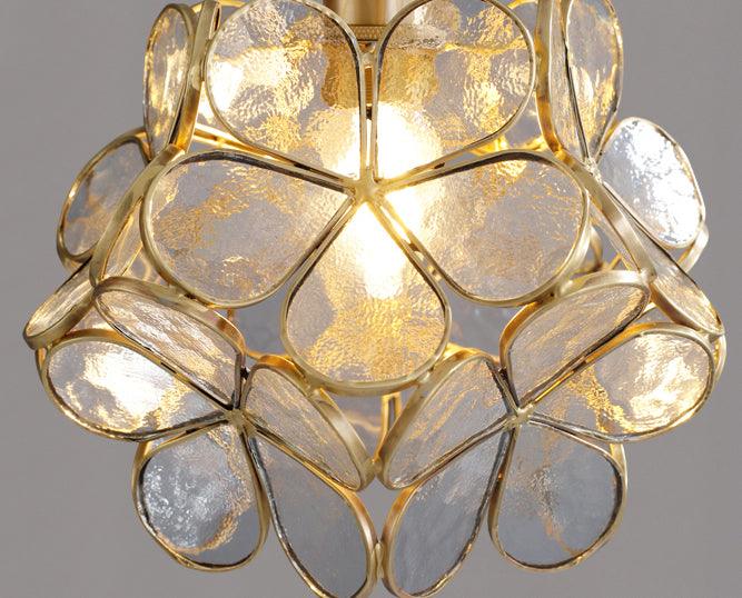 Close-up of the clustered glass petals lit from inside