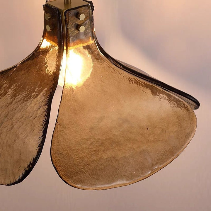 Close-up of the Amber Bloom Glass Pendant Light lit from within