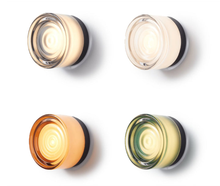 Four Ripple Glass Surface Mount Lights side by side in white, clear, amber and jade